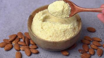 Fresh almond flour in a  bowl and almonds video