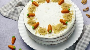 Homemade Easter carrot cake made with walnuts, iced with cream cheese. video