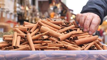 stack of Cinnamon sticks selling on spice bazar video