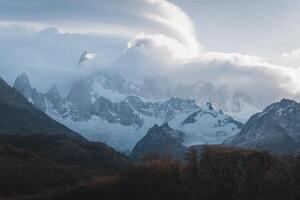 Trekking traveler enjoy Fitz Roy Mountain view, Patagonia, El Chalten - Argentina photo