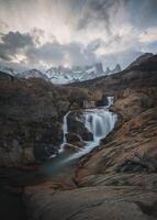 Trekking traveler enjoy Fitz Roy Mountain view, Patagonia, El Chalten - Argentina photo