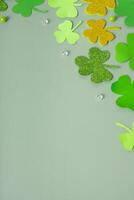 Green clover leaves with copy space top view. St. Patrick's Day background photo
