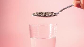 close up of chia seeds in a glass of water video