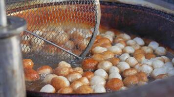 Traditional fried sweets lokma in sugar syrup video