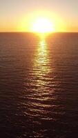 Vertical video of Sea at Sunset Aerial View