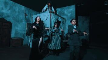 Dramatic dance performance with actors in dark costumes on stage video