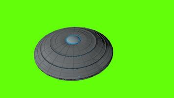 UFO flying round spaceship flying from left to right seen from above against green background. 3D animation video