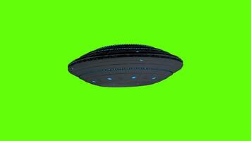 UFO flying round spaceship flying with turbulence seen from front against green background. 3D animation video