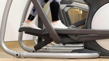 Cardio workout on an elliptical trainer. video