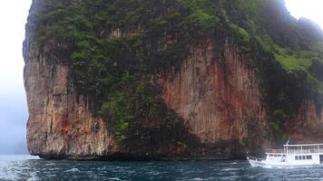 Krabi Ao Nang Thailand 2018 Koh Phi Phi Thailand speed boat longtail boats limestone rocks. video