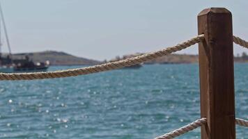 Summer Cruise Boat Passing in Front of the Pier Rope video