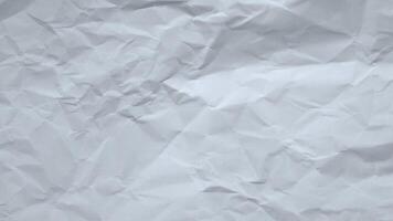 stop motion video of crumpled paper, animation of paper crumpled motion video background, paper on white background video