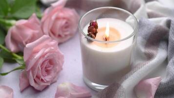 Aromatic candle on the table.  Soy candles  in a jar. Aromatherapy and relax in spa and home. Still life. video