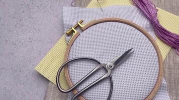 Embroidery hoop, fabric, thread and other accessories video