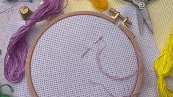 Embroidery hoop, fabric, thread and other accessories video