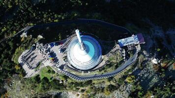 Aerial top down view of TV tower and hotel Jested in Liberec Czechia in October 2023 video