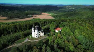 Aerial side view of Makova hora - Poppy hill a pilgrimage site in Czechia in September 2023 video