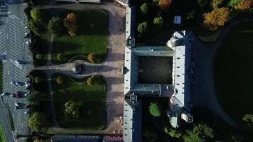 Aerial ascending top down view of chateau Sychrov in Czechia in October 2023 video