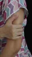 Vertical, Massage your arms to relieve pain. video