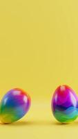 Three colorful eggs sitting on yellow surface with yellow background. Vertical looped animation video