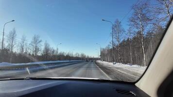 View from the car window on the highway, traveling in winter. High quality 4k footage video