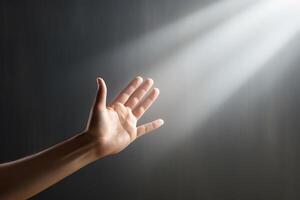 ai generado un del hombre mano alcanza fuera a el rayos de ligero en contra el antecedentes de un gris pared. concepto de espiritual vida, apoyo. generado por artificial inteligencia foto