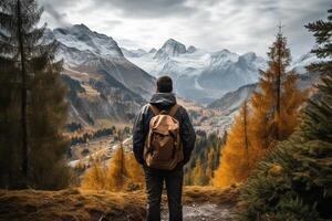 AI generated A man with a backpack behind his back looks at the mountains. Travel alone concept. Generated by artificial intelligence photo