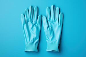 ai generado azul protector guantes, un elemento de ropa de trabajo en un azul antecedentes. generado por artificial inteligencia foto