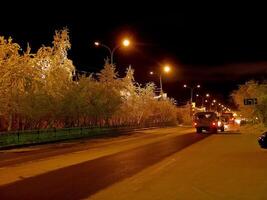 Night Salekhard. Night city in colorful lights. Salekhard is the capital of the Yamal-Nenets Autonomous District photo