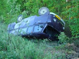 The car which moved down in a ditch as a result of accident photo