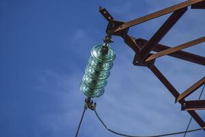 Glass prefabricated high voltage insulators on poles high-voltag photo