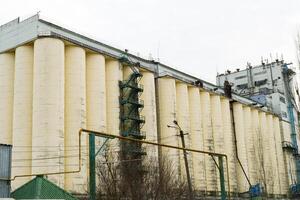 Building for storing and drying grain photo