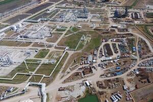 Refinery. Ready-to-use areas with equipment and equipment under construction. Site for a warehouse of building materials and metal. photo