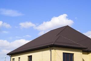 Decorative metal on the roof of the house. photo