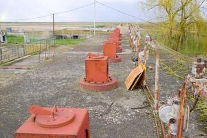 Valves for opening pipes of a water pumping station. Gateway ope photo