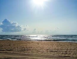 Sea line of the horizon. Sea and sky. The waves and glare of the sun are reflected from the waves of the sea. Seascape. photo