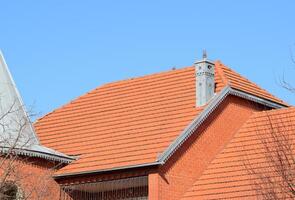 The house with a roof of tiles photo