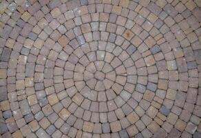 Background texture of paving slabs in circles photo