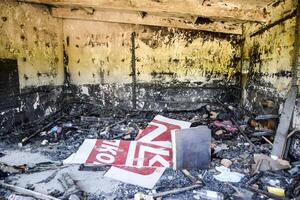 Burned gas station. Ruins in the place of a burnt petrol station. photo