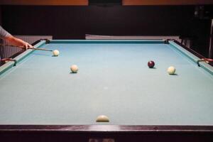 Billiards, billiard table. Balls on the billiard table. photo