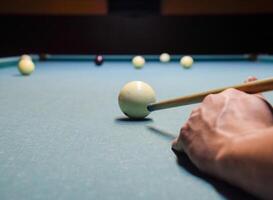 Billiards, billiard table. Targeting the cue in the ball for imp photo