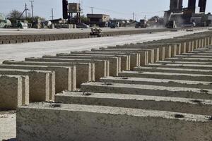 Cinder blocks lie on the ground and dried. on cinder block production plant. photo