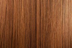 Close up of brown hair as background. Texture of natural hair. photo