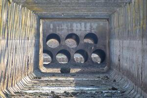 inside view of the irrigation artificial concrete channel. photo