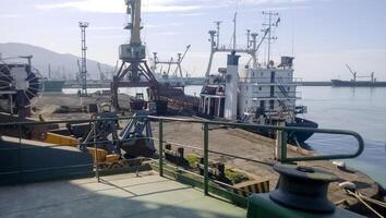 Berth in the port. Industrial cargo port photo