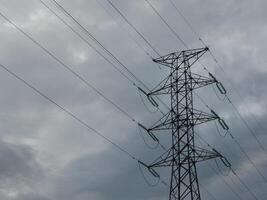 High voltage post. High voltage tower. Electricity distribution station photo