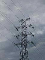 High voltage post. High voltage tower. Electricity distribution station photo