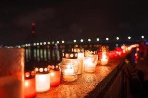 Nighttime Candle Display by Waterfront Celebrating Latvia's Independence photo