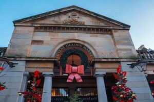Experience the Christmas Decorations at the Covent Garden Market Entry, London. photo