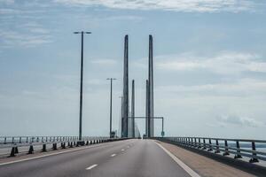 Oresund Bridge's Modern Design, Calm Day from Denmark to Sweden. photo